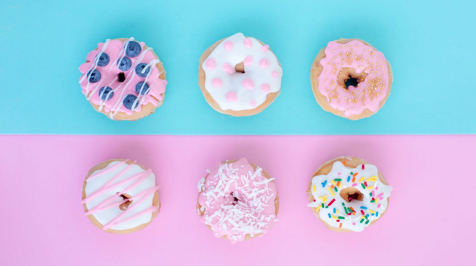 A colourful selection of donuts with sprinkles