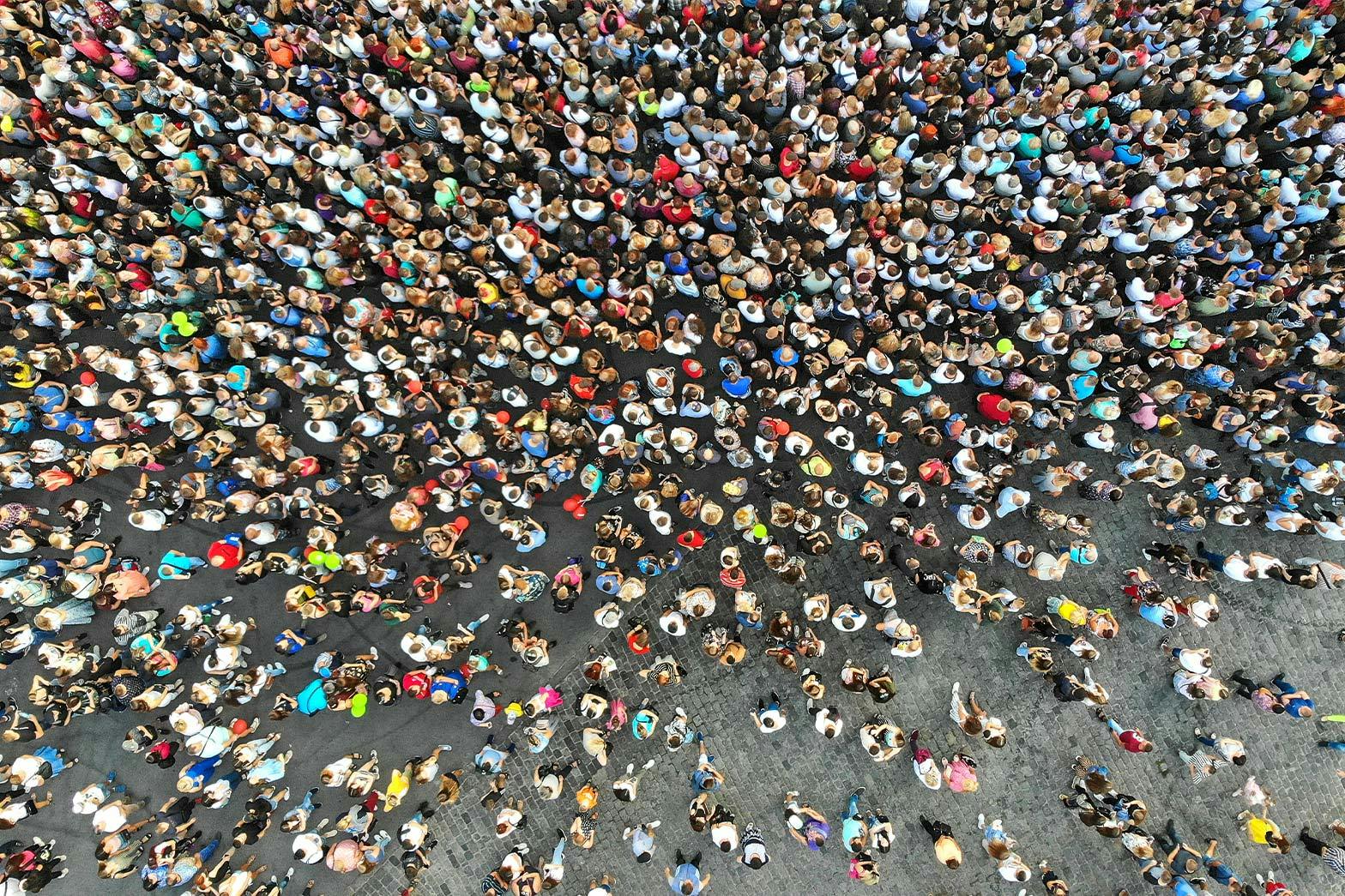 A crowd of people photographed from above
